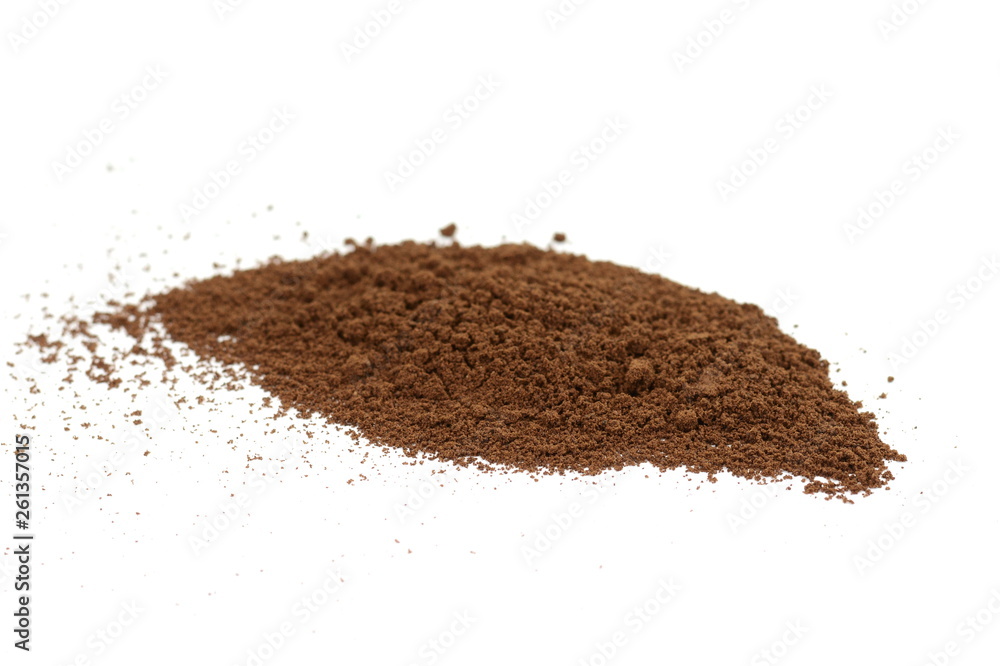 Coffee powder isolated of white background. A little coffee over a white surface. Milled coffee. Coffee powder isolated of white background. A little coffee over a white surface. Milled coffee.