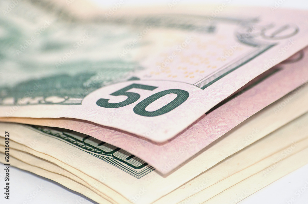 Money on white background with space for copy, isolate, closeup Money on white background with space for copy, isolate, closeup