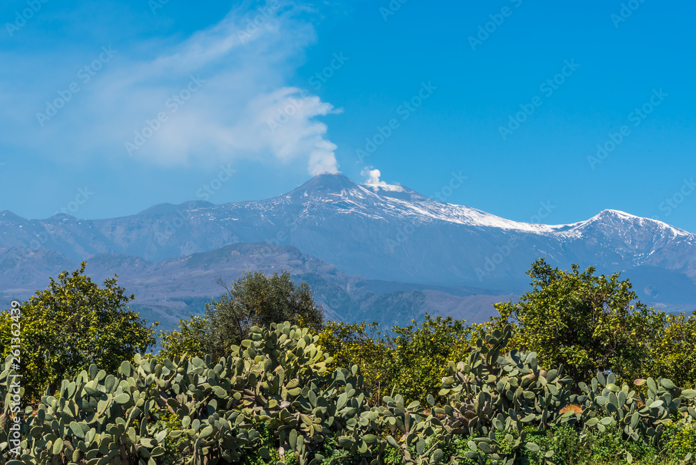 Fototapeta premium Mt. Etna Volcano Emitting Smoke on a Sunny Day