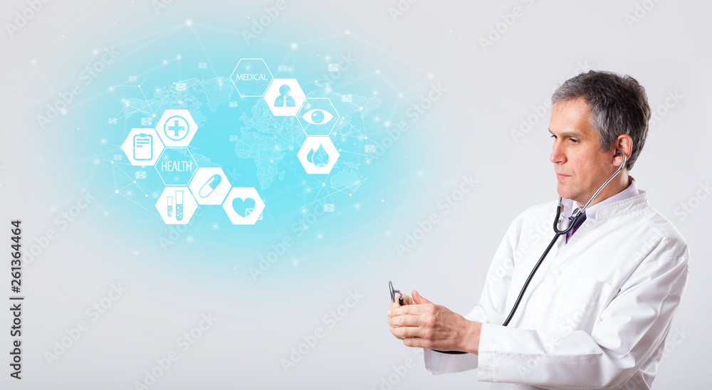 Middle aged professional doctor with medical concept
Middle aged professional doctor with medical concept