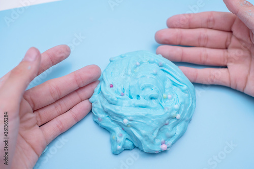 child plays with a slime