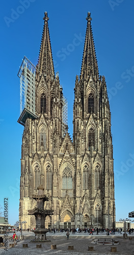 Obraz na płótnie Western facade of the Cologne Cathedral in evening, Germany. Construction of the Cathedral began in 1248. Currently it is the tallest twin-spired church at 157 m (515 ft) tall. w salonie