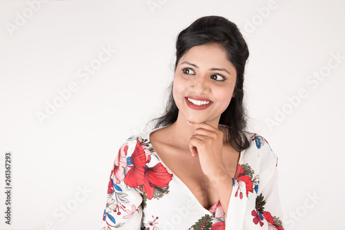 Pretty young female posing on white background