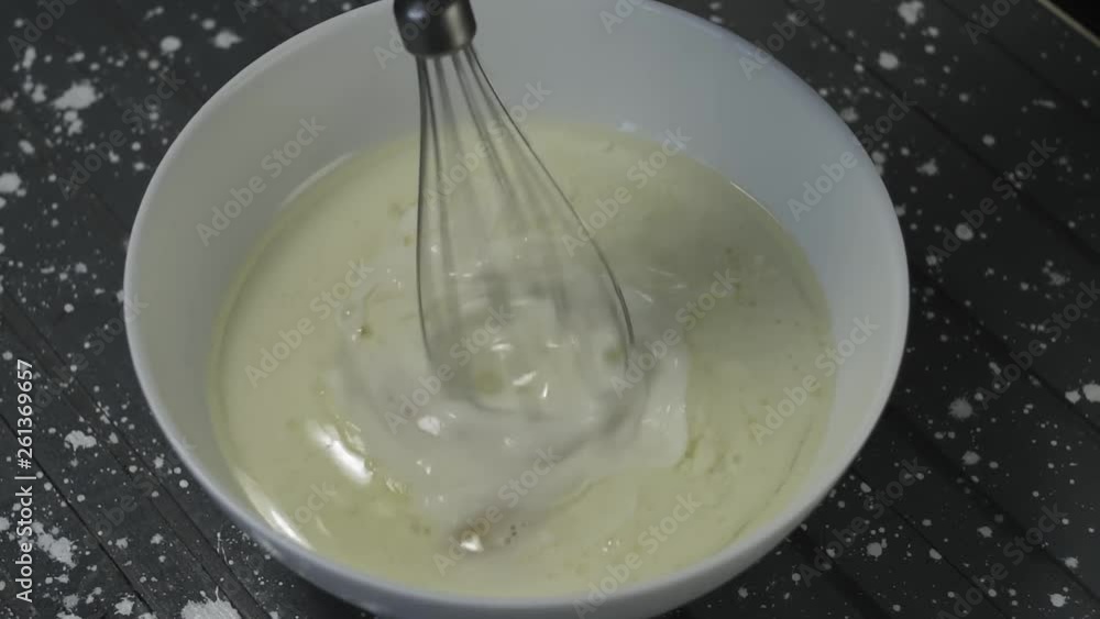 Close-up, Slow Motion, Mixer Beats Ingredients for Dough Close-up, Slow Motion, Mixer Beats Ingredients for Dough