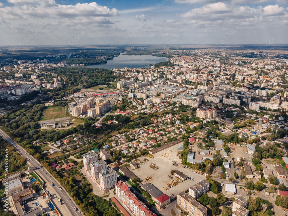 landscape view over city on summer sunny day with clouds aerial and view to lake landscape view over city on summer sunny day with clouds aerial and view to lake
