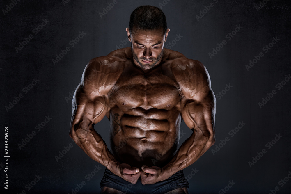 Bodybuilder Flexing Muscles Bodybuilder Flexing Muscles