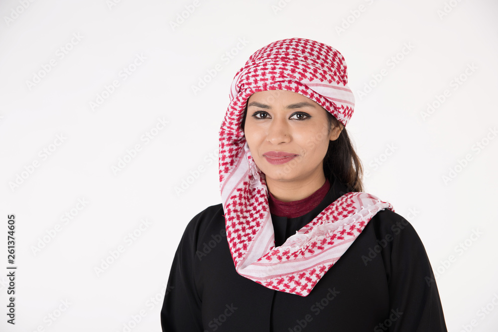 Young Arab female in traditional dress on white background Young Arab female in traditional dress on white background