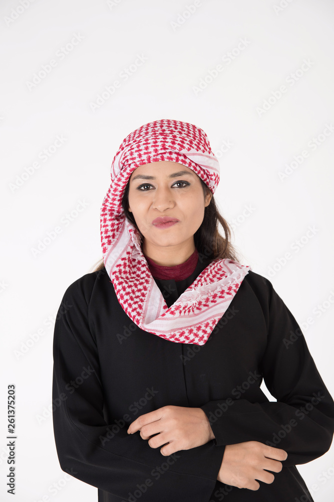 Young Arab female in traditional dress on white background Young Arab female in traditional dress on white background
