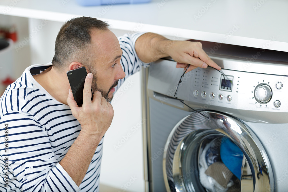 man using smart phone on the phone man using smart phone on the phone