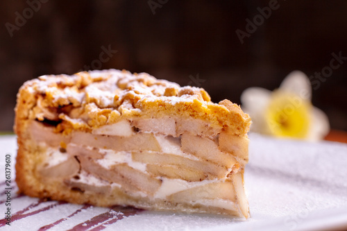 Classic American apple pie. with flowers on background