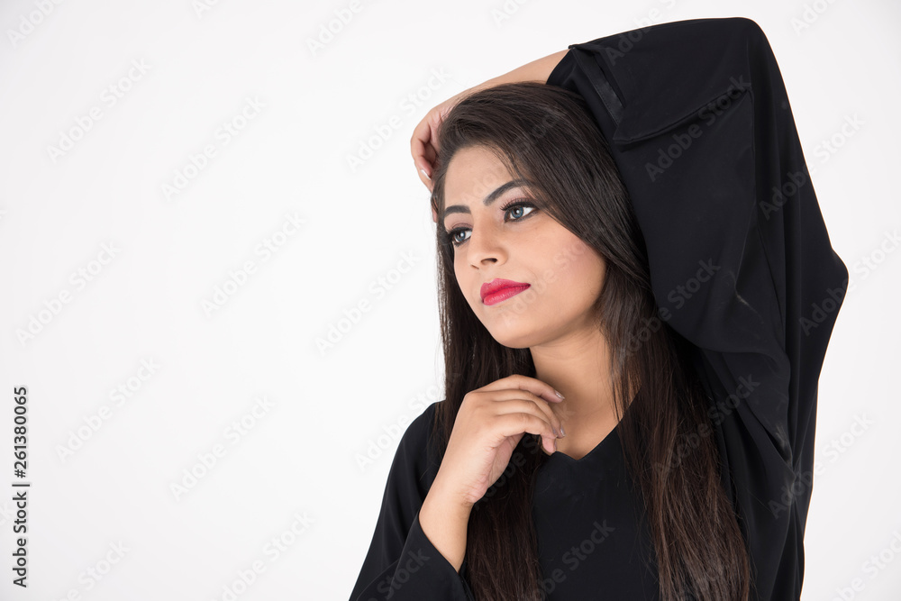 Fototapeta premium Arab woman in traditional dress on white background