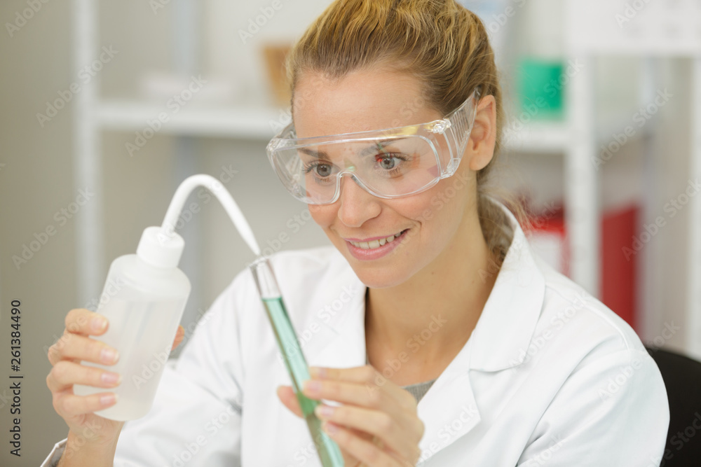 woman working with pipe liquids woman working with pipe liquids