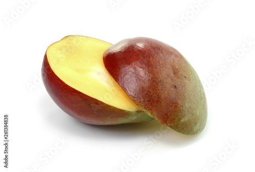 Juicy dessert mango isolated on white background. Sweet Mango slices. 