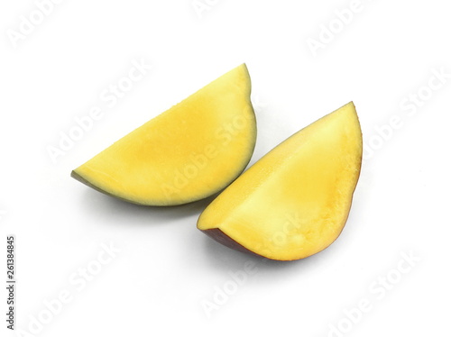 Juicy dessert mango isolated on white background. Sweet Mango slices. 
