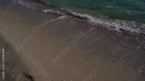 Wallpaper Mural Slowmotion. Sea waves with foam in windy weather in the spring at the sea coast. Side view Torontodigital.ca