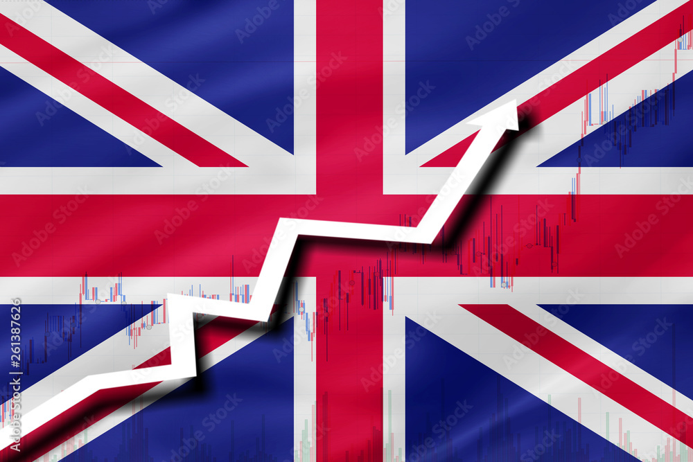 White arrow and stocks chart growth up on the background of the flag of UK (United Kingdom) White arrow and stocks chart growth up on the background of the flag of UK (United Kingdom)