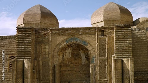 Steady, medium wide shot of the front on Magak-I Attari Mosque in Bukhara, Uzbekistan. photo