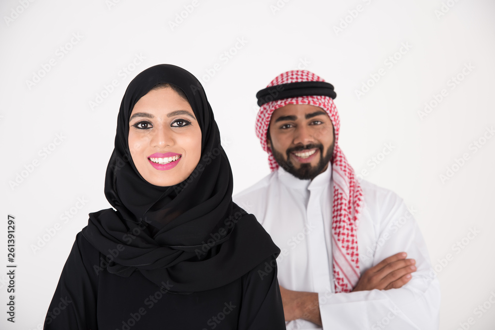 arab couple smiling and standing on white background arab couple smiling and standing on white background
