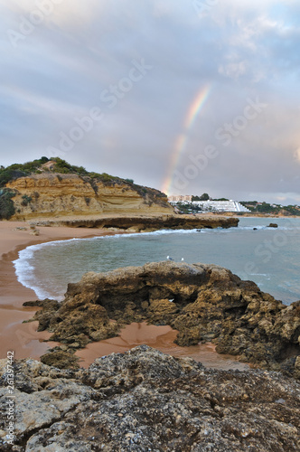 Beautiful Rainbow sight in Aveiros beach. Albufeira, Algarve, Portugal photo