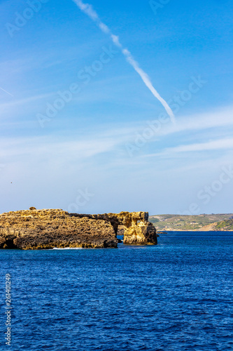 Mediterranean Sea view of a Comino Island natural arch