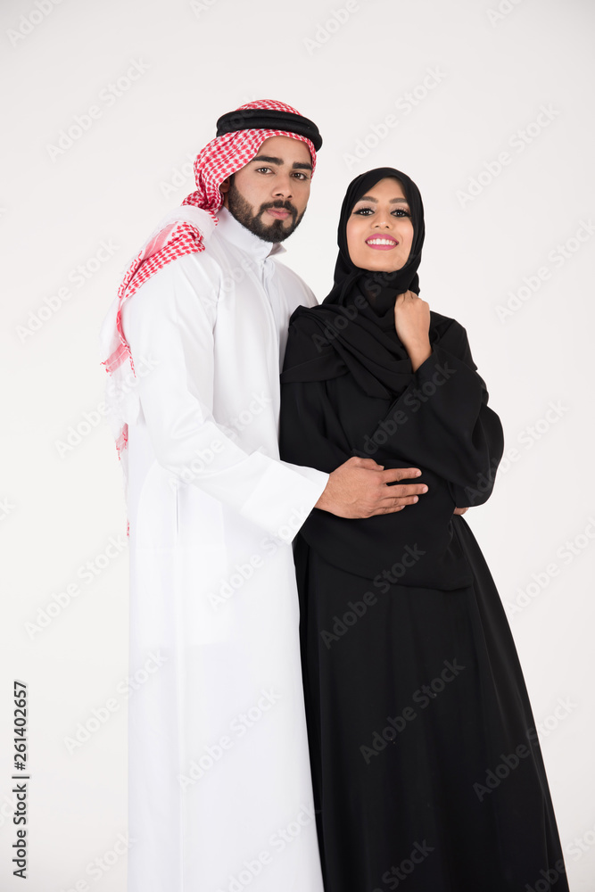 Arab couple standing on white background