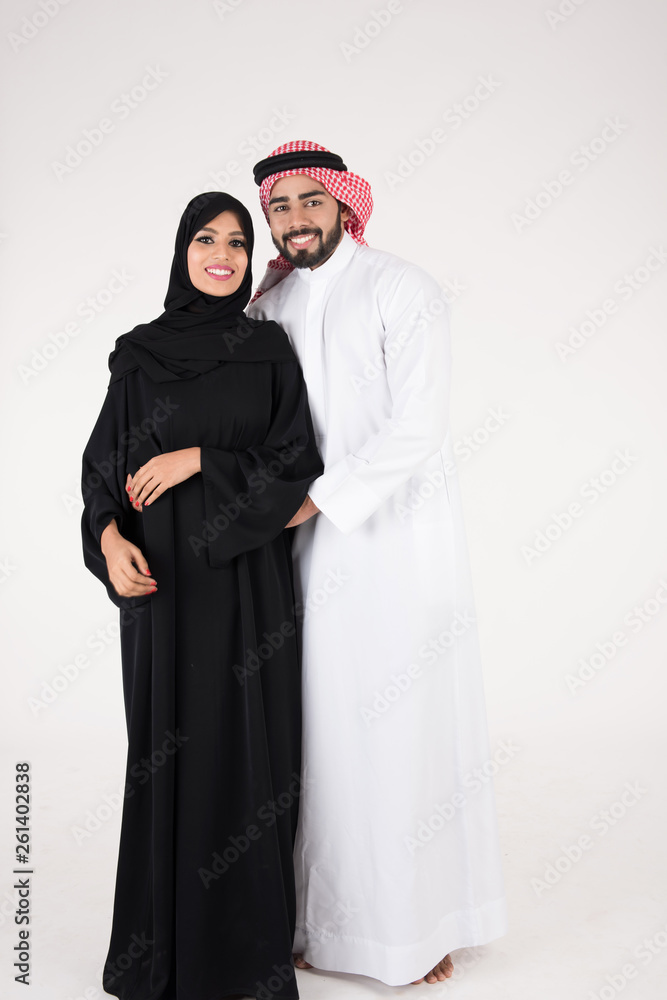 Arab couple standing on white background