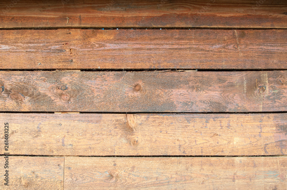 Wood texture background. Rustic wood grain background texture. Wooden wall of long boards. Wood texture background. Rustic wood grain background texture. Wooden wall of long boards.