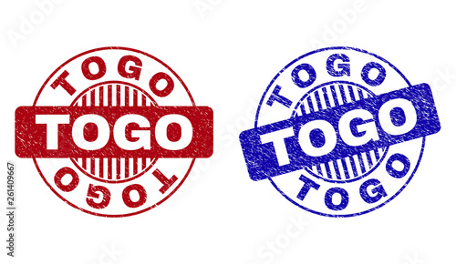 Grunge TOGO round stamp seals isolated on a white background. Round seals with grunge texture in red and blue colors. Vector rubber imprint of TOGO caption inside circle form with stripes.