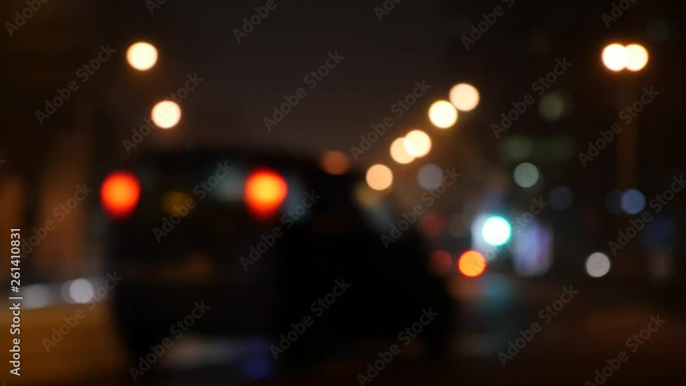 Defocused night traffic lights. Blur view of traffic in city at night. Defocused night traffic lights. Blur view of traffic in city at night.