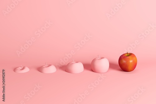 Outstanding fresh red apple and slices of apple painted in pink on pink background. Minimal fruit idea concept.