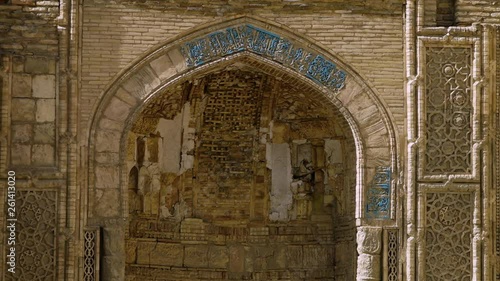 Steady, medium close up shot of the entrance of the Magak-I Attari Mosque in Bukhara, Uzbekistan. photo