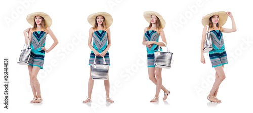Pretty woman with summer handbag and panama isolated on white