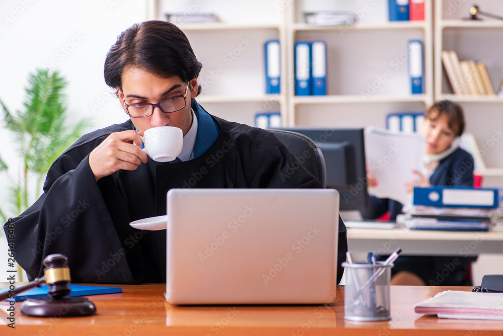 Two lawyers working in the office Two lawyers working in the office