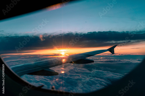Airplane Flight at Sunset