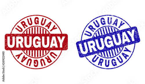 Grunge URUGUAY round stamp seals isolated on a white background. Round seals with grunge texture in red and blue colors. Vector rubber imprint of URUGUAY caption inside circle form with stripes.
