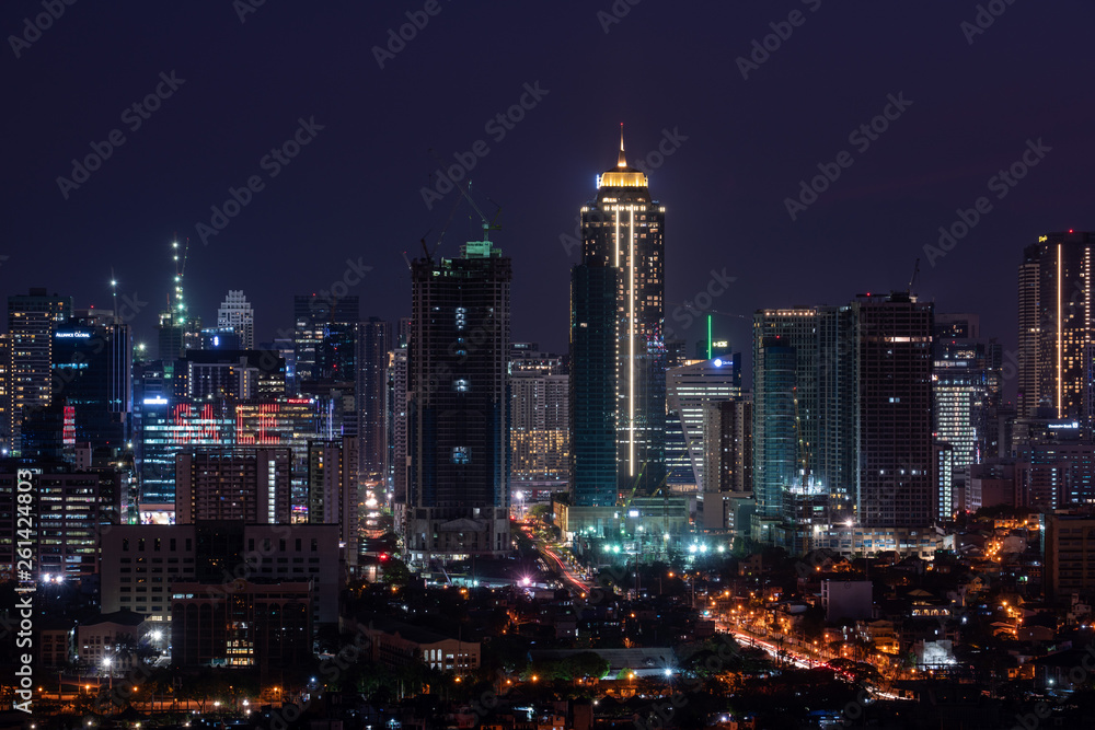 Naklejka premium Bonifacio Global city skyline at Magic hour 
