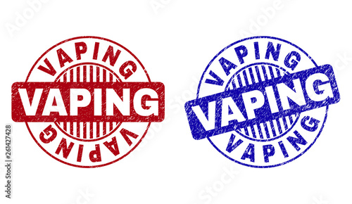 Grunge VAPING round stamp seals isolated on a white background. Round seals with grunge texture in red and blue colors. Vector rubber imprint of VAPING caption inside circle form with stripes.