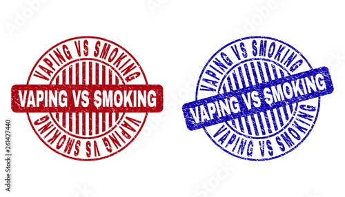 Grunge VAPING VS SMOKING round stamp seals isolated on a white background. Round seals with grunge texture in red and blue colors.