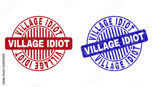 Grunge VILLAGE IDIOT round stamp seals isolated on a white background. Round seals with grunge texture in red and blue colors.