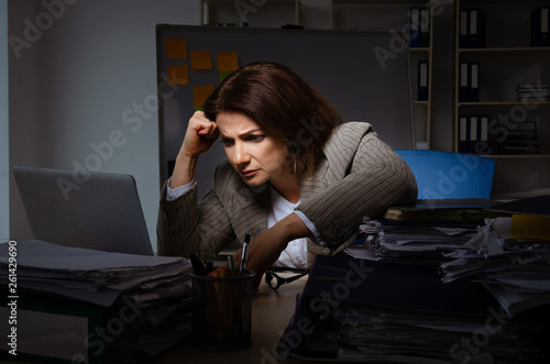 Female employee suffering from excessive work    © Elnur