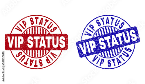 Grunge VIP STATUS round stamp seals isolated on a white background. Round seals with grunge texture in red and blue colors. Vector rubber overlay of VIP STATUS title inside circle form with stripes.