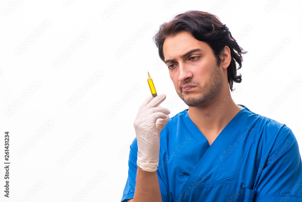 Young handsome doctor isolated on white Young handsome doctor isolated on white