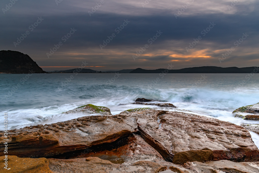 Soft High Cloud Sunrise Seascape from Rock Platform Soft High Cloud Sunrise Seascape from Rock Platform