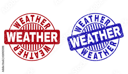 Grunge WEATHER round stamp seals isolated on a white background. Round seals with grunge texture in red and blue colors. Vector rubber imprint of WEATHER label inside circle form with stripes.