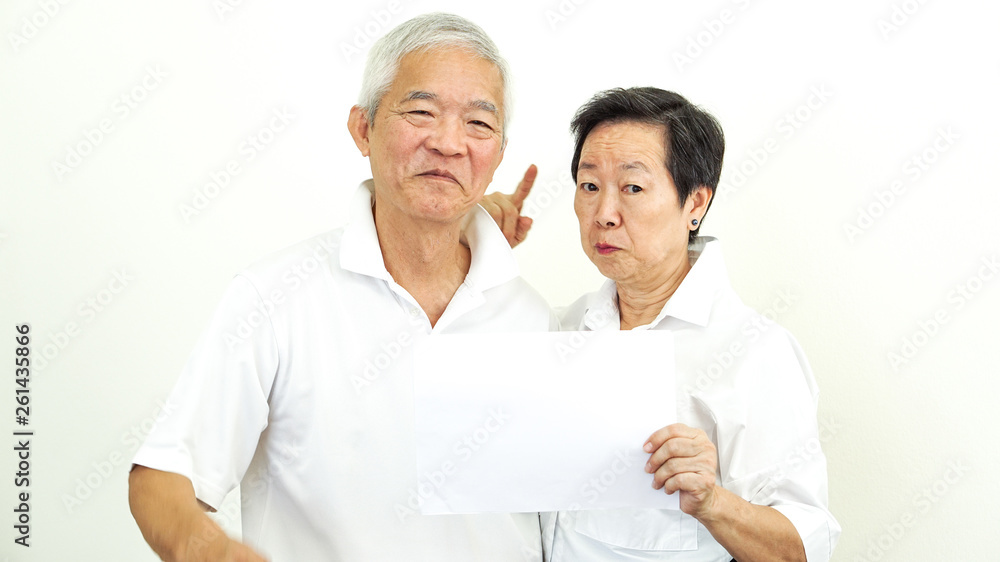 Asian elderly couple hold blank sign advertisment happy recommend Asian elderly couple hold blank sign advertisment happy recommend