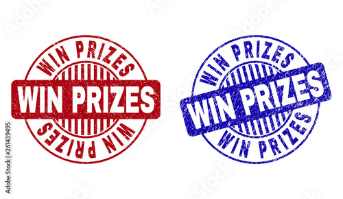 Grunge WIN PRIZES round stamp seals isolated on a white background. Round seals with distress texture in red and blue colors.