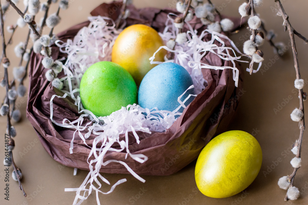 Easter eggs in a basket of pink tinsel Easter eggs in a basket of pink tinsel