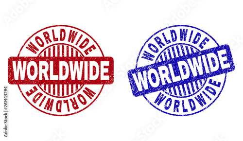 Grunge WORLDWIDE round stamp seals isolated on a white background. Round seals with grunge texture in red and blue colors. Vector rubber overlay of WORLDWIDE tag inside circle form with stripes.