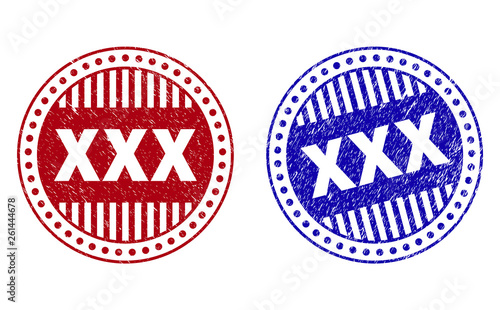 Grunge XXX round stamp seals isolated on a white background. Round seals with grunge texture in red and blue colors. Vector rubber watermark of XXX title inside circle form with stripes.