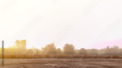 sunrise at the morning and dirt field